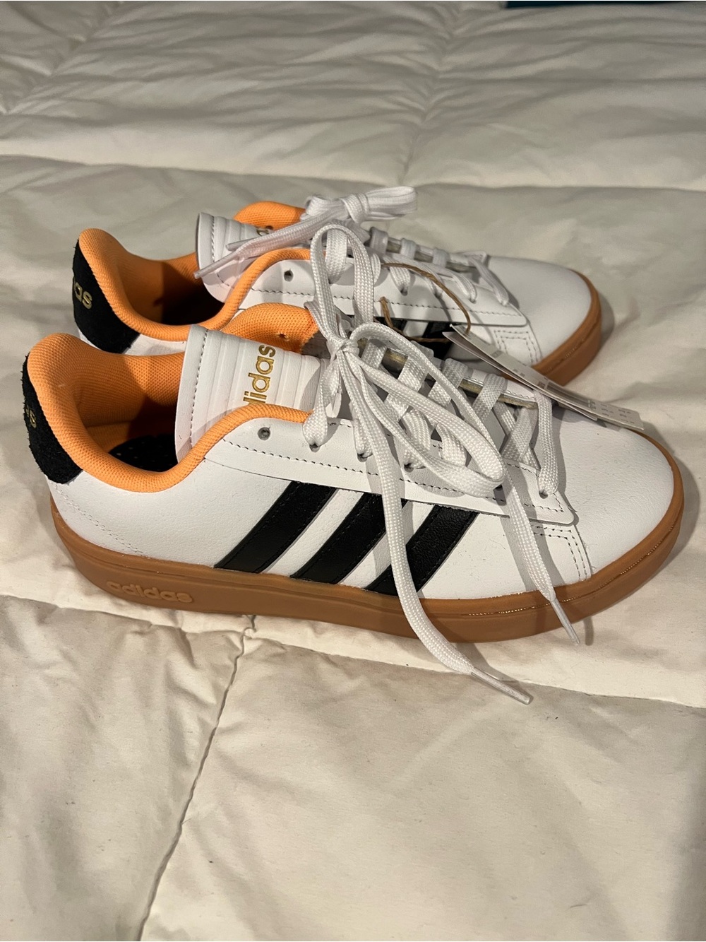 adidas Men’s White Black Gum Low-Top Sneaker with Orange Lining